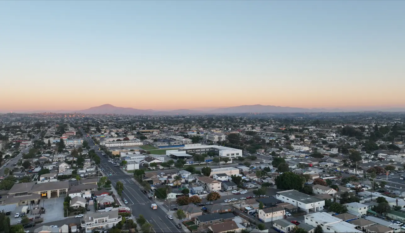 drone view of skyline at sunset